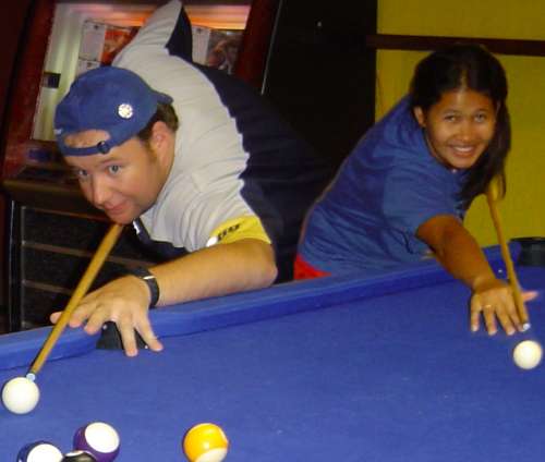 playing pool at Fraser Roving Backpackers - the Simon and Dany way